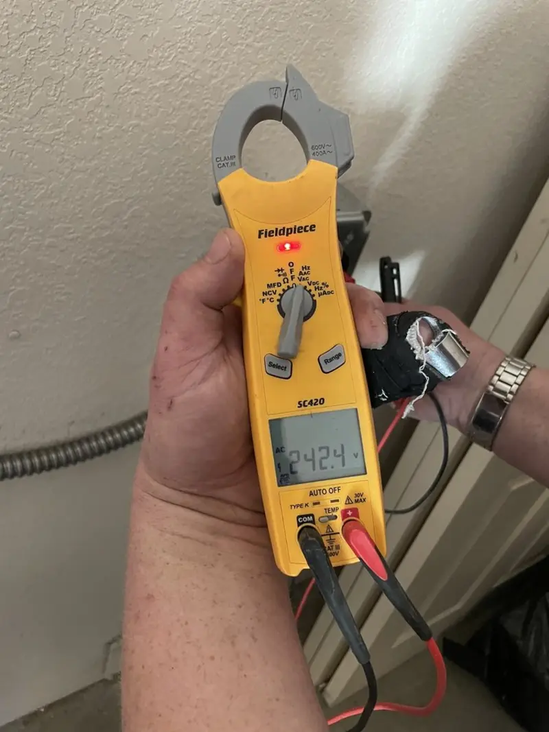 Voltage testing with clamp meter during Generator Installation in Hammond